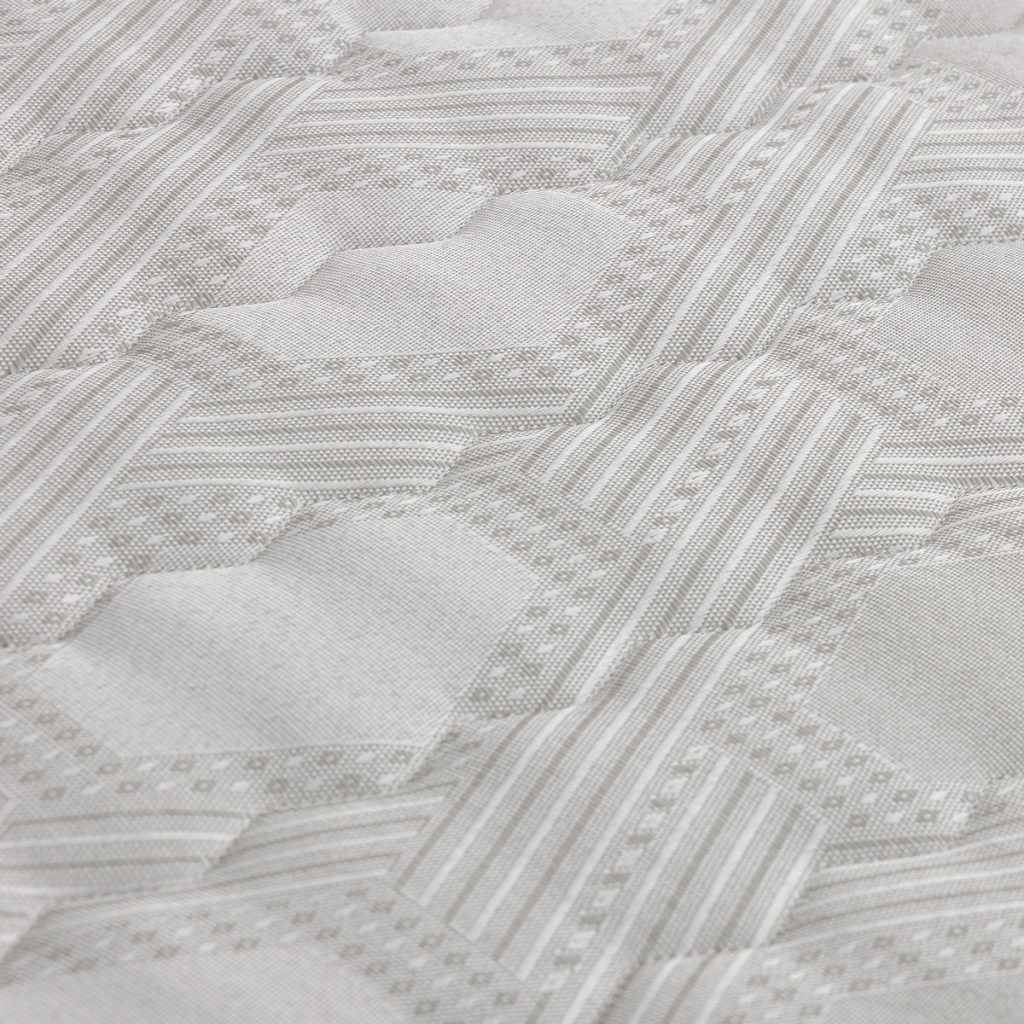 Nardelli Sonnix, primo piano del cotone damascato trapuntato